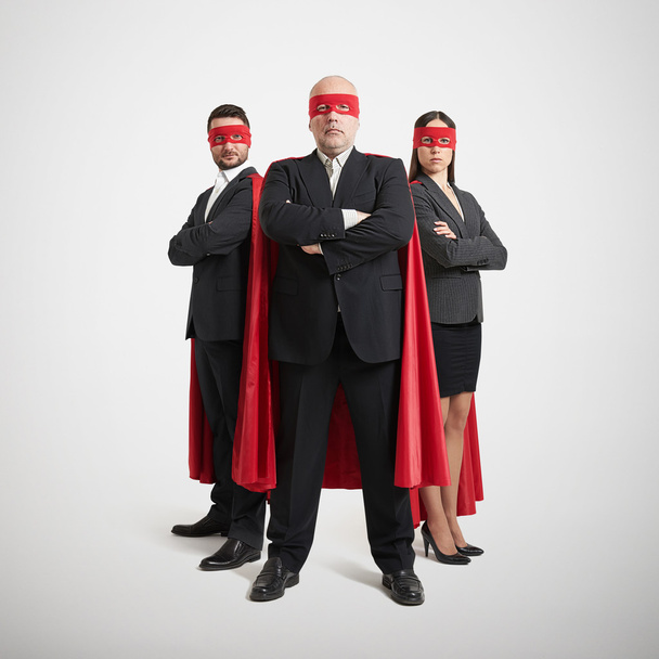 três super-heróis em desgaste formal
 - Foto, Imagem