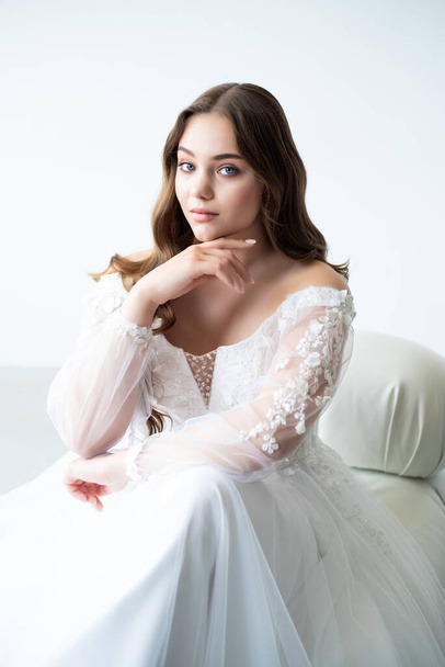 young bride posing in a white room - Photo, Image