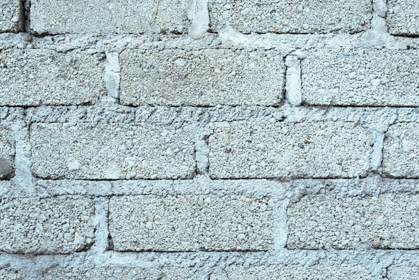 Muro di mattoni di cemento. Sfondo, texture. - Foto, immagini