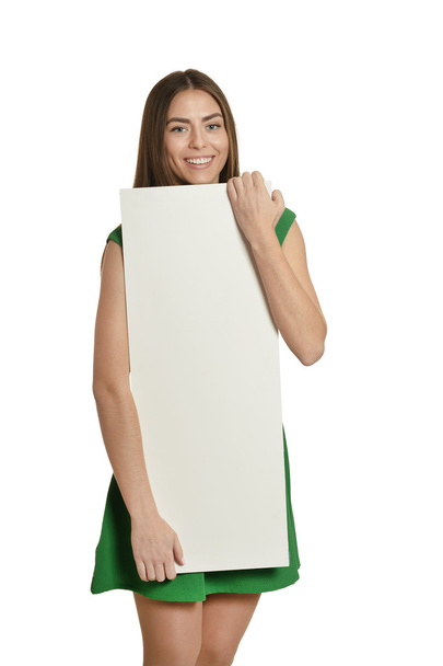 Beautiful woman and white signboard - Foto, afbeelding