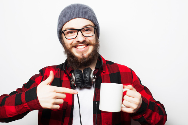 man with a cup of coffee - Φωτογραφία, εικόνα