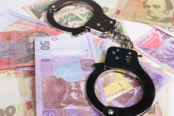 Criminal. Handcuffs and money. Corruption - Foto, imagen