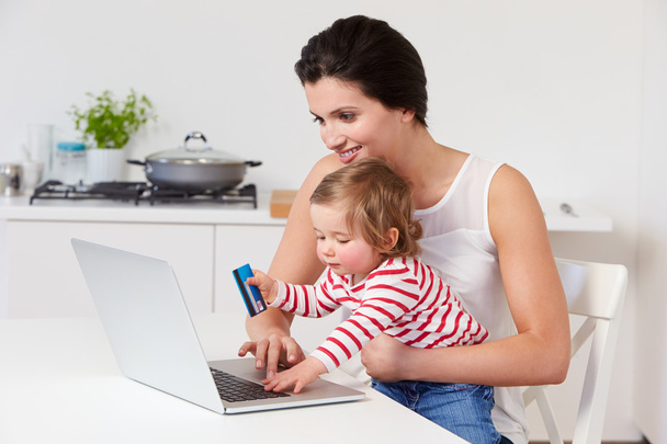Mother With Child Using Laptop - Фото, изображение
