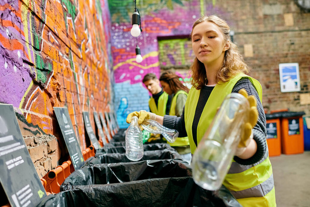 A woman standing beside a vibrant graffiti-covered wall, expressing urban creativity and culture. - Φωτογραφία, εικόνα