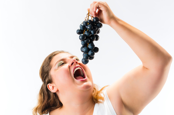 Healthy eating - woman with grapes - 写真・画像