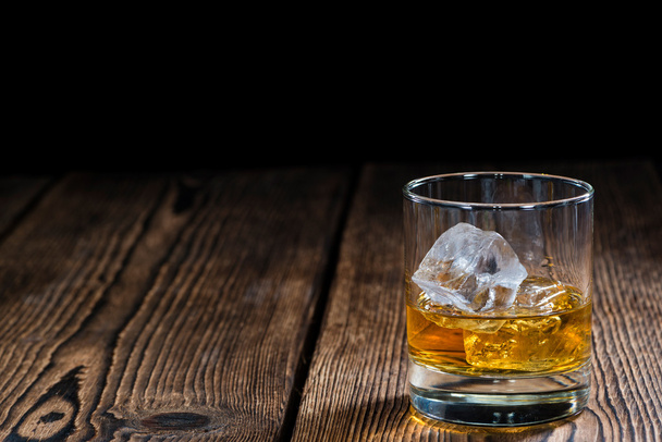Glass of Whiskey with ice - Photo, Image