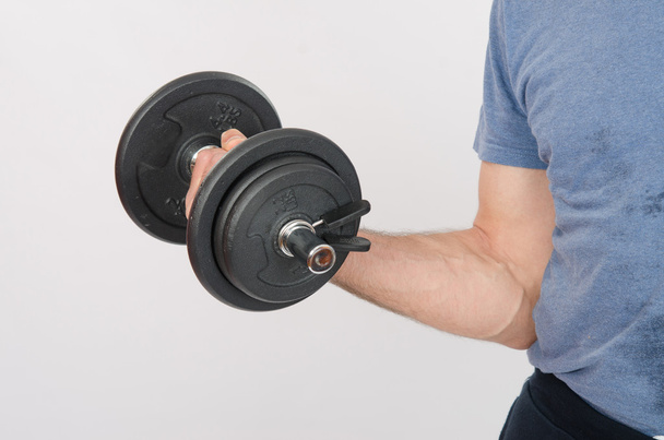 Hand athlete with dumbbell - Photo, Image