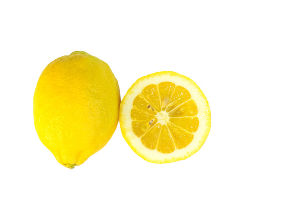 Limón y medio aislado sobre fondo blanco
 - Foto, Imagen