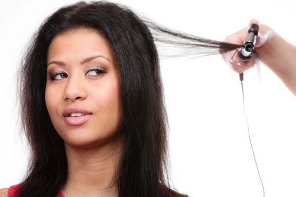  Girl hairdo with electric hair curler - Фото, изображение