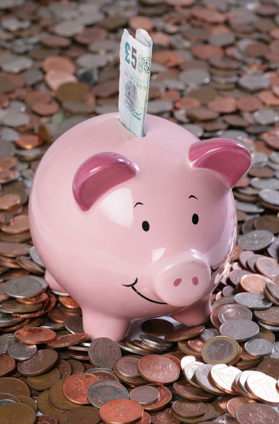 Piggy bank with money background - Photo, Image