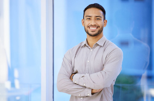 Portrait, business and man with arms crossed, office and employee with smile, confidence and career ambition. Face, agent and consultant with pride for startup, entrepreneur and insurance agency. - Foto, imagen