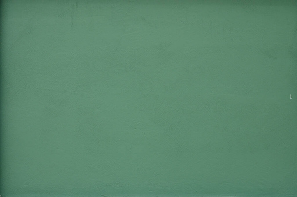 背景として濃い緑色の古いグランジの壁の具体的な質. 1 インチ - 写真・画像