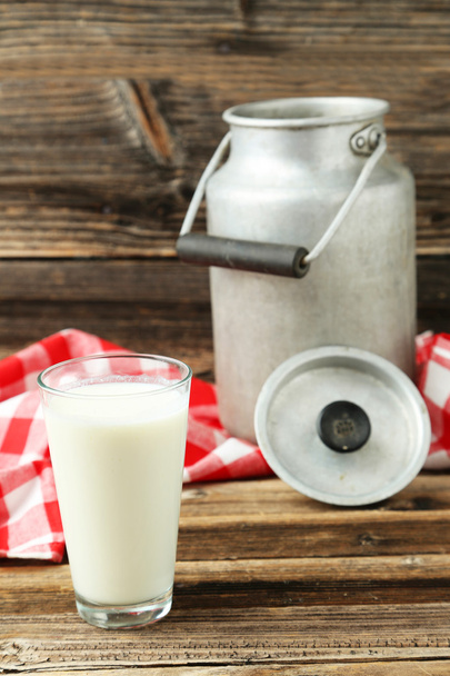 Can and glass of milk - Valokuva, kuva