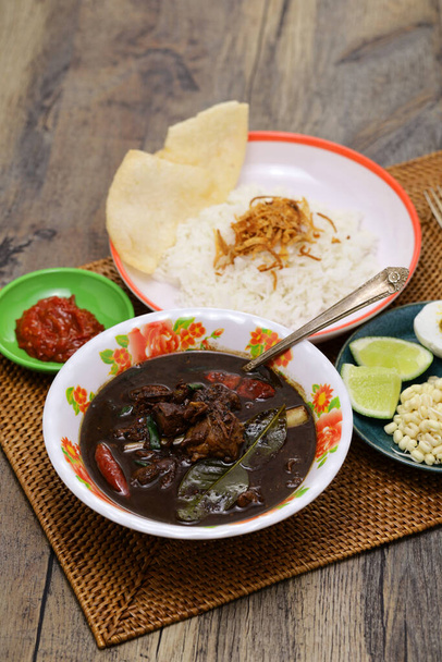 nasi rawon, Indonesian black beef soup with rice.  - Photo, Image