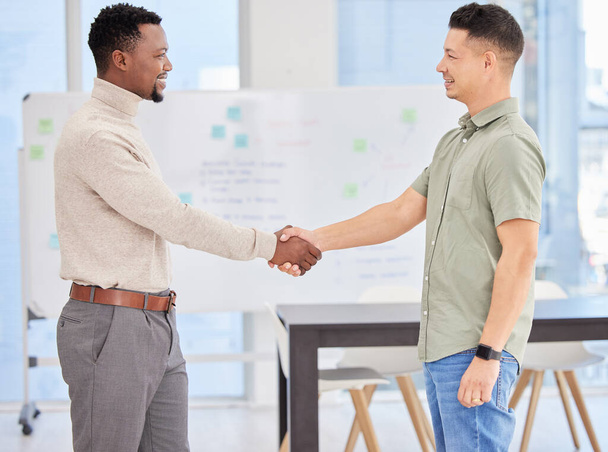 Men, handshake and teamwork in office for meeting, thank you and welcome support or networking. Partners, workplace and employees for agreement on business deal, recruitment and b2b for merger offer. - Photo, Image