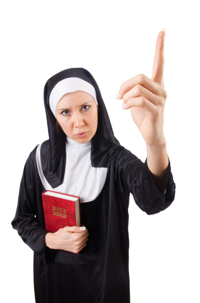 Ładny zakonnica z Biblii na białym tle - Zdjęcie, obraz