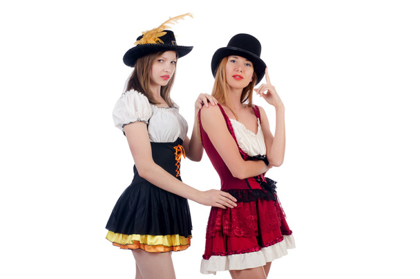 Девушки в баварских костюмах, изолированные на белом
 - Фото, изображение