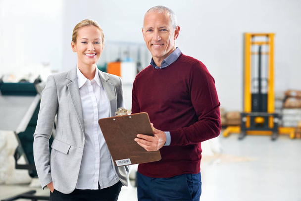 Inspection, teamwork or portrait of people in warehouse for stock in workshop, supply chain or production. Woman, clipboard or happy managers in factory for industrial process, checklist or resources. - Photo, Image