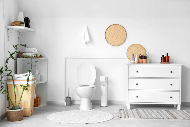 Interior of modern bathroom with ceramic toilet bowl - Photo, Image