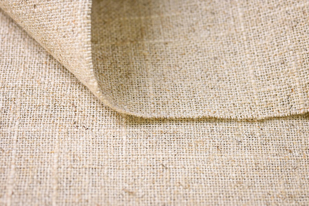коричневая конопля вискозно-натуральная ткань ткани, мешковина грубая текстура текстильной моды абстрактный фон - Фото, изображение