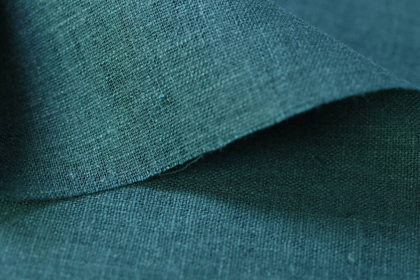 πράσινο καννάβι βισκόζη φυσικό ύφασμα χρώμα ύφασμα, σάκο τραχιά υφή του υφάσματος μόδας αφηρημένο φόντο - Φωτογραφία, εικόνα