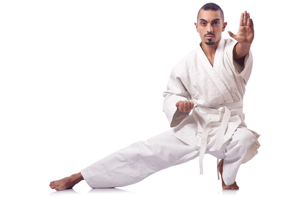 Karate fighter isolated on the white - Photo, Image
