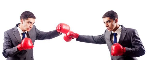 Бизнесмен в боксерских перчатках на белом
 - Фото, изображение