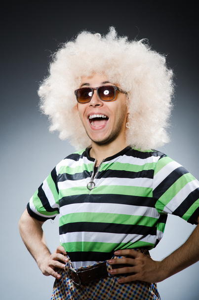 Funny man with afro hairstyle against the gradient - Foto, Imagem