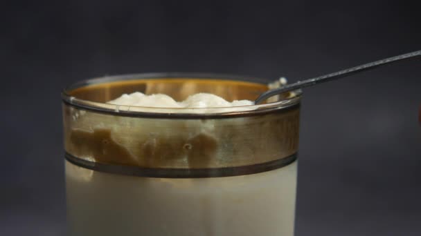 glass of whole cream milk on table ,  - Materiaali, video
