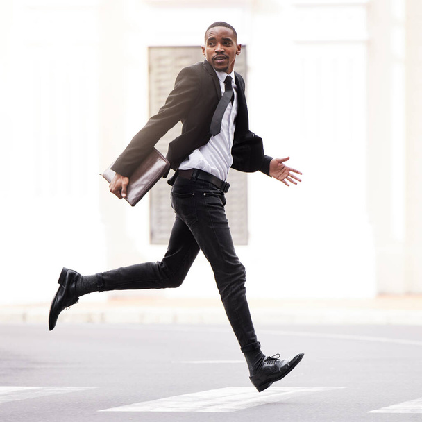 Late, rush and businessman with running in city for company meeting, appointment or business trip. Black man, anxiety and stress in street with panic for corporate, job interview and opportunity. - Photo, Image