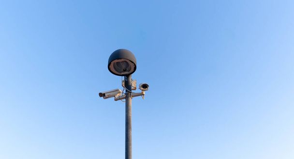video surveillance cameras filming a public square - Photo, Image
