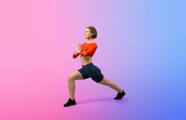 Full body length gaiety shot athletic and sporty woman doing healthy and meditative yoga exercise workout posture on isolated background. Healthy active and body care lifestyle - Photo, Image