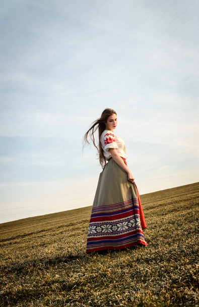 young woman in Slavic Belarusian national original suit outdoors - Φωτογραφία, εικόνα