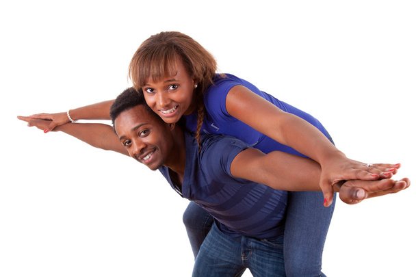 Portrait of a happy young couple having fun - Fotó, kép