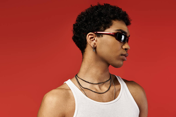 Young man in white tank top and shades. - Photo, Image