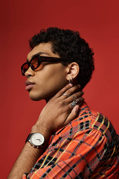 Handsome African American man in glasses and plaid shirt - Photo, Image