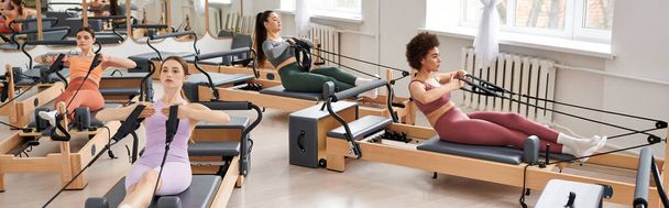 Athletic women gracefully performing exercises during a Pilates session in a gym. - Photo, Image