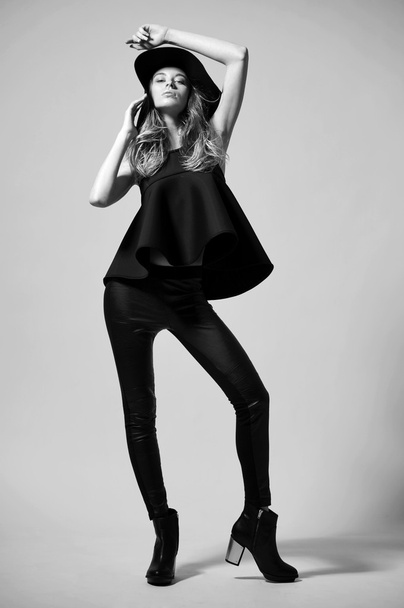 Fashion woman model in black dress - 写真・画像