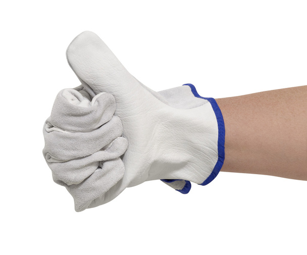 Gloved hand signaling thumb up - Photo, Image