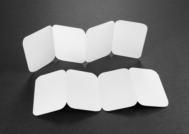 blank white folding paper flyer - 写真・画像