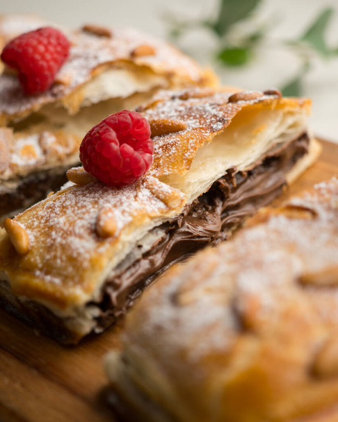 Chocolate San Juan Coca. Traditional San Juan cake to celebrate the arrival of summer in Spain made with puff pastry and cocoa cream. - Photo, Image