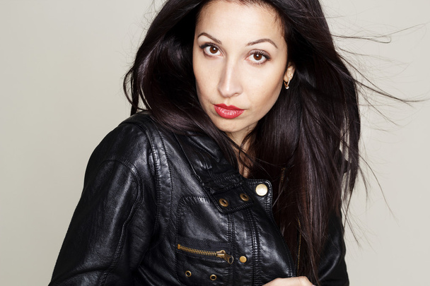 Portrait of sexy beautiful young woman in leather jacket - Photo, Image