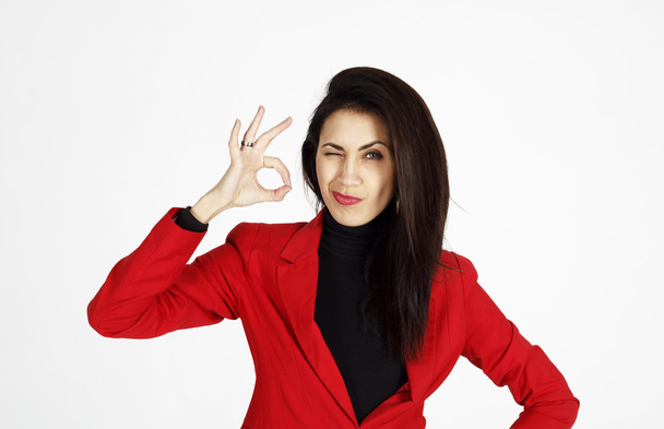 Portrait of young beautiful business woman showing showing hand  - Фото, изображение