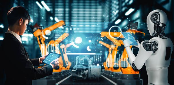 MLP Mechanizovaný průmyslový robot a lidský pracovník pracující společně v budoucí továrně. Koncept umělé inteligence pro průmyslovou revoluci a automatizační výrobní proces. - Fotografie, Obrázek