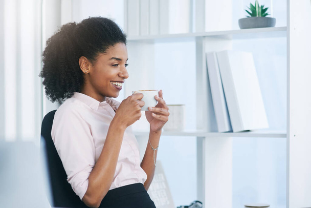 Thinking, business and woman with coffee, relax and corporate professional with smile, aroma and smelling. Insurance agent, employee and consultant with morning tea, peace and cappuccino in workplace. - Photo, Image