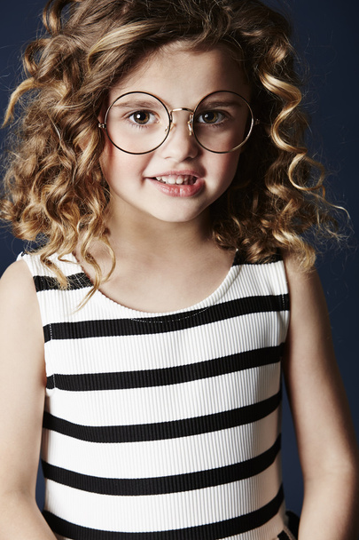 Young girl in glasses and dress - 写真・画像