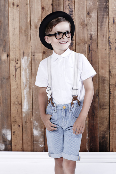 Boy in shirt and braces posing - Fotó, kép
