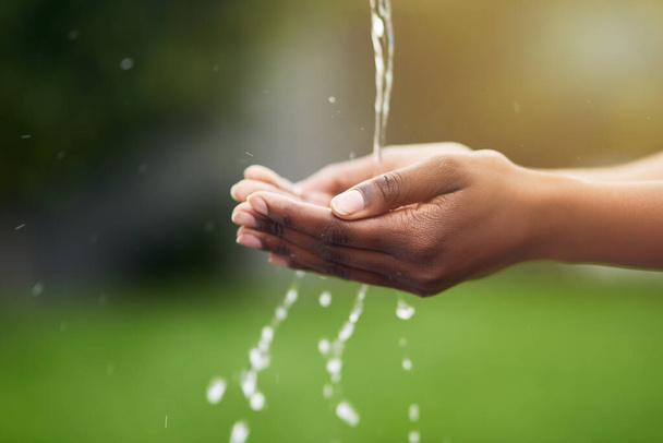 Hands, water and sustainability with hygiene for environment, health and eco friendly for cleaning. Ecology, future and person with nature nature for sanitation, wellness and care with conservation. - Photo, Image