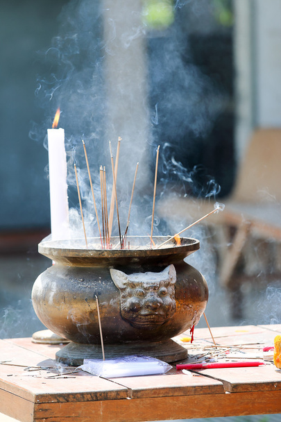 Prayers burning incense  - Φωτογραφία, εικόνα