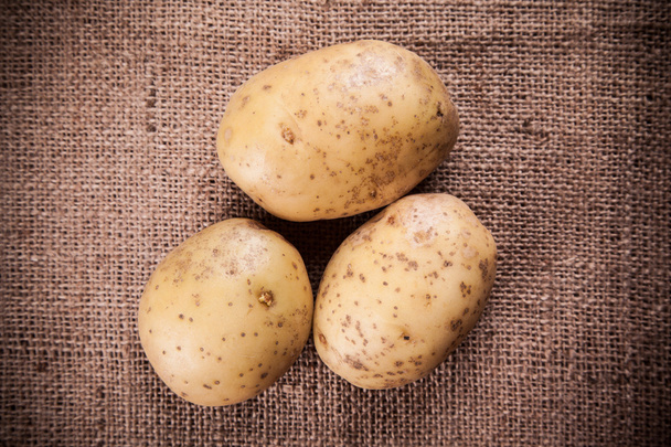 Three Fresh Potatoes - Foto, afbeelding